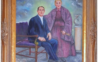Abuelos sentados en un cuadro herencia